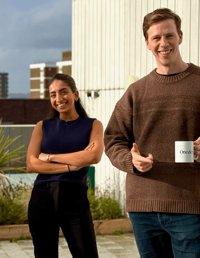 Team at rooftop dinner, London
